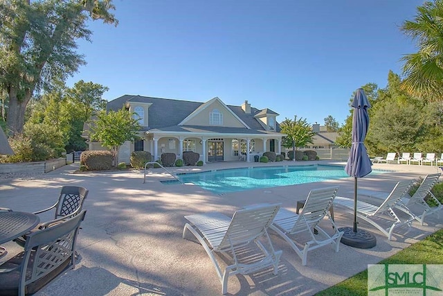 view of pool featuring a patio