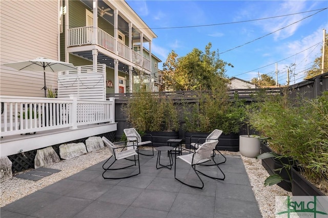 view of patio / terrace with a balcony