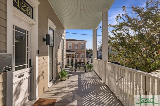 balcony featuring covered porch