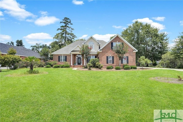 view of front of home with a front yard