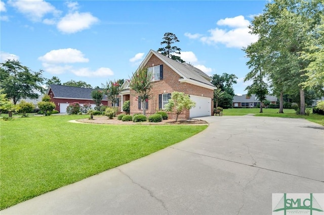 view of front facade featuring a garage and a front yard