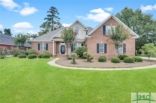 view of front facade featuring a front yard