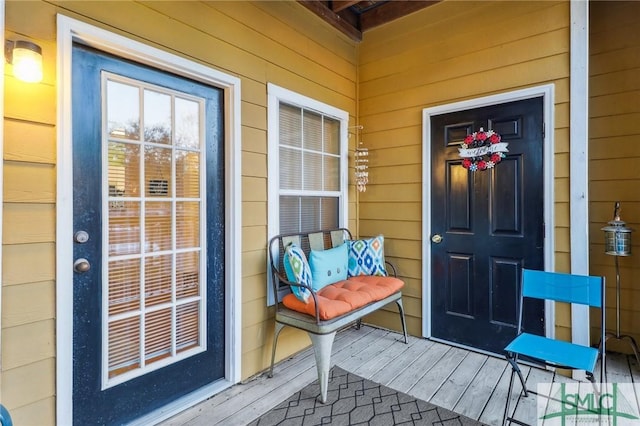 entrance to property featuring a porch