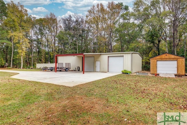 garage with a lawn