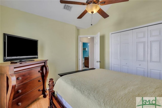 bedroom with a closet, ceiling fan, and hardwood / wood-style flooring