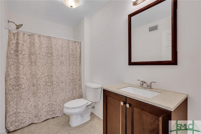 bathroom with tile patterned flooring, vanity, toilet, and a shower with curtain