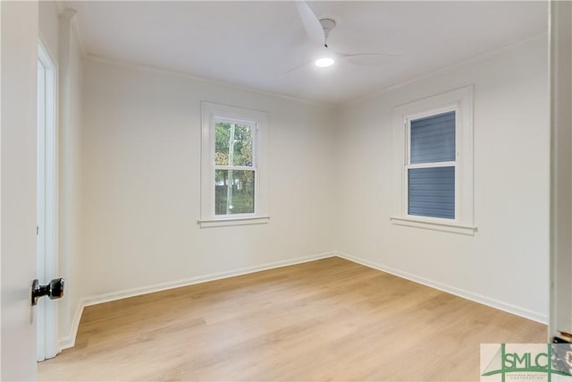 unfurnished room featuring light hardwood / wood-style floors, crown molding, and ceiling fan