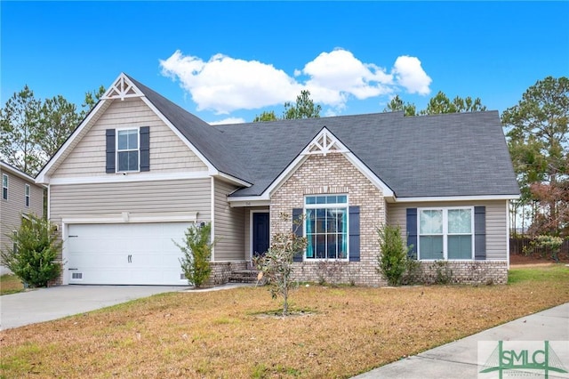 view of front facade with a garage and a front lawn