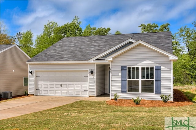 view of front facade with cooling unit, a garage, and a front lawn