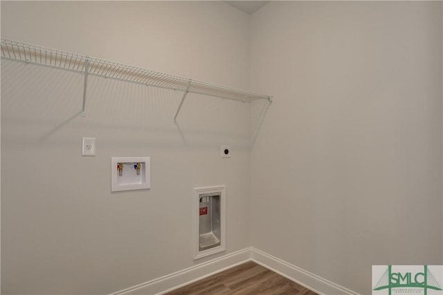 laundry area with hardwood / wood-style flooring, washer hookup, and hookup for an electric dryer