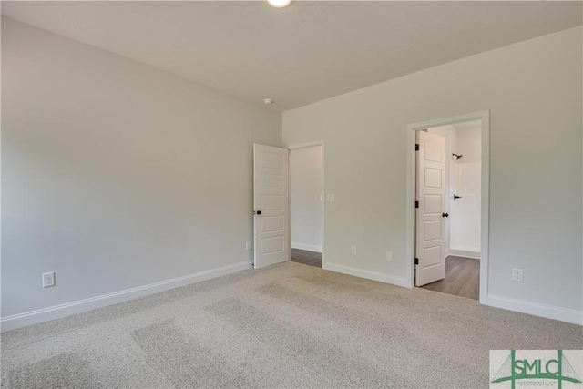 unfurnished bedroom featuring carpet flooring