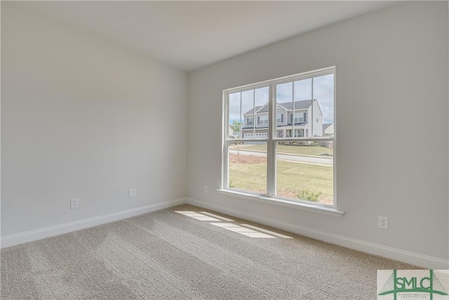 unfurnished room with carpet