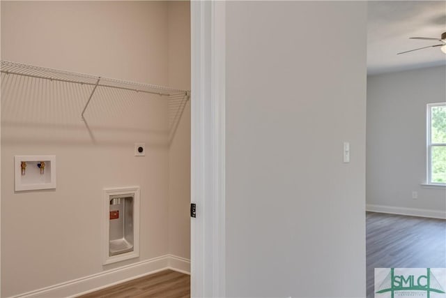 laundry room featuring hookup for an electric dryer, hookup for a washing machine, ceiling fan, and hardwood / wood-style flooring