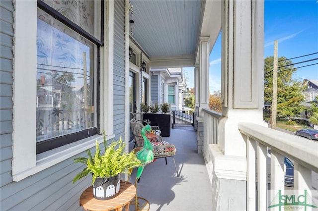 balcony featuring a porch