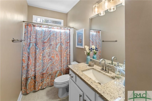 bathroom featuring tile patterned floors, curtained shower, vanity, and toilet