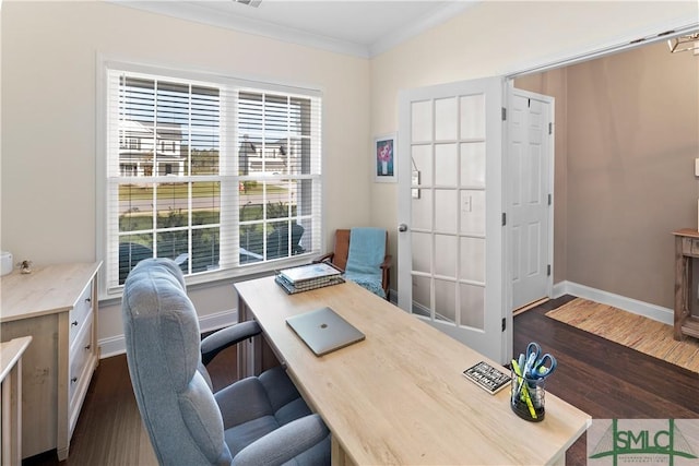 office space with dark hardwood / wood-style floors and crown molding