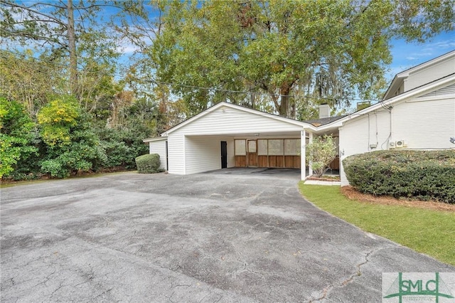 garage with a carport