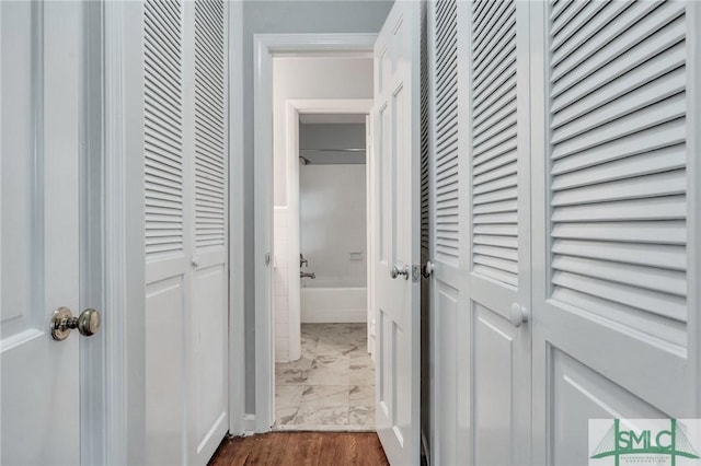 hall with dark hardwood / wood-style floors