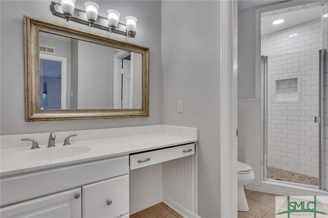 bathroom with walk in shower, tile patterned flooring, vanity, and toilet