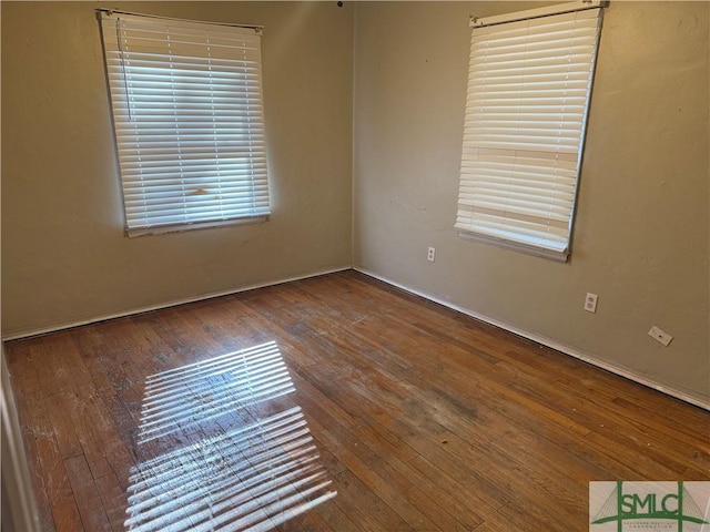 empty room featuring hardwood / wood-style floors