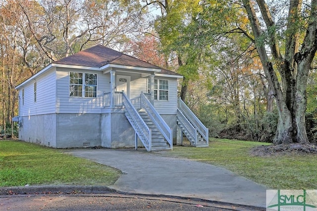 view of front of home with a front yard