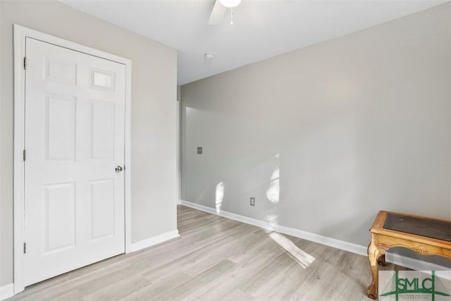 unfurnished bedroom featuring ceiling fan and light hardwood / wood-style flooring