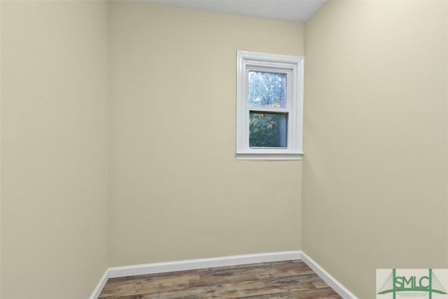 spare room featuring hardwood / wood-style floors