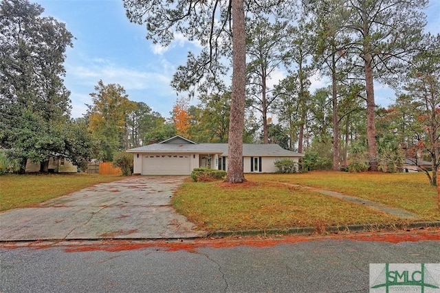 ranch-style house with a garage and a front lawn