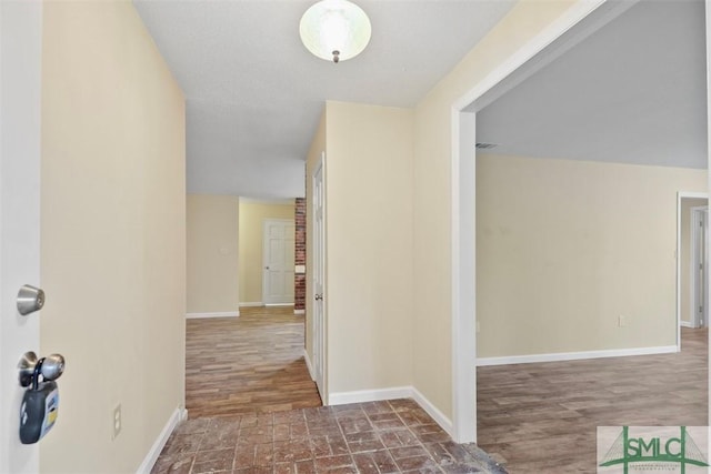 hall featuring dark hardwood / wood-style flooring