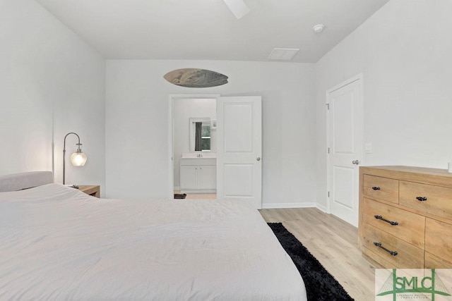 bedroom with light hardwood / wood-style floors