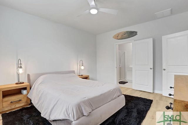 bedroom with ceiling fan and light hardwood / wood-style flooring