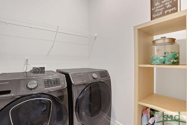 laundry area with washer and clothes dryer