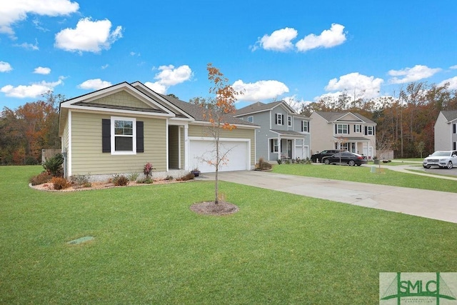 view of front of house with a front yard and a garage