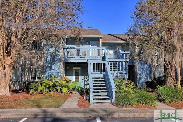 view of front of house with a wooden deck