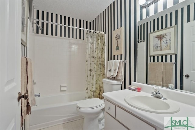 full bathroom with shower / tub combo, vanity, toilet, and a textured ceiling