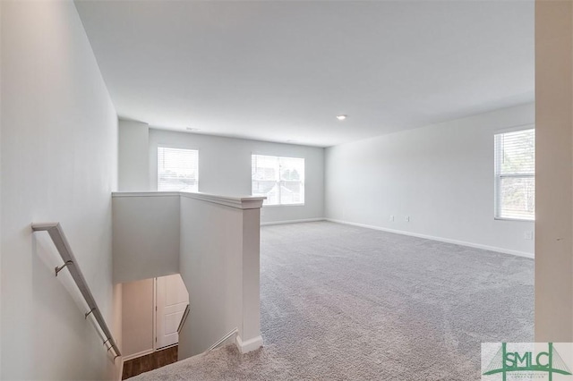 unfurnished room with carpet floors