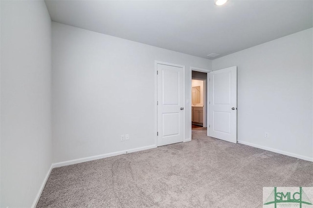 spare room with carpet floors