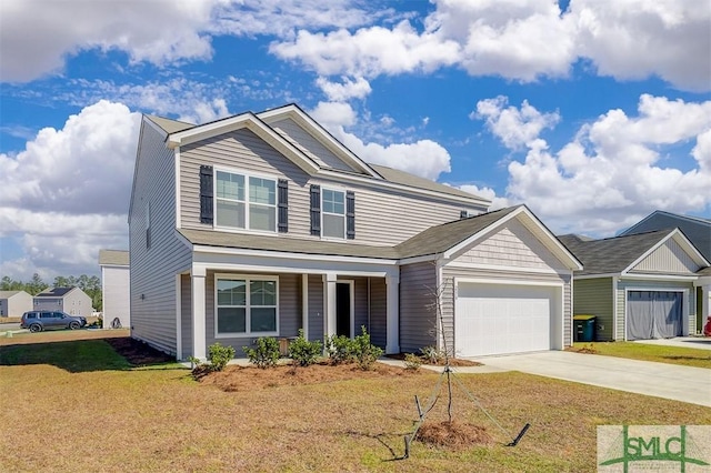 view of front of house with a garage and a front lawn