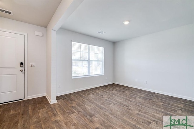 entrance foyer featuring dark wood-type flooring