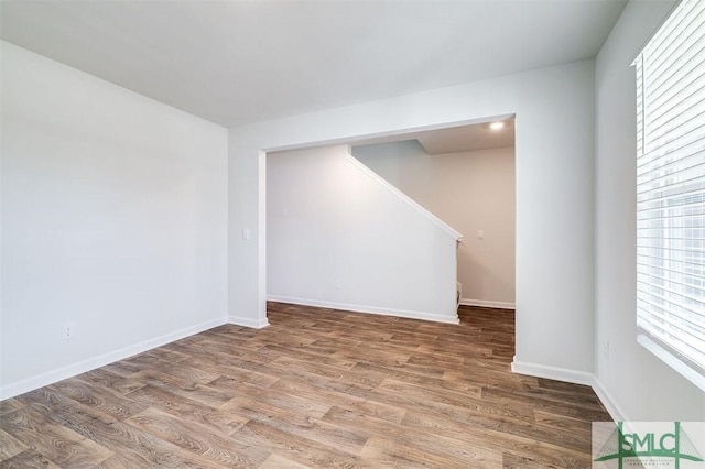 empty room featuring hardwood / wood-style flooring