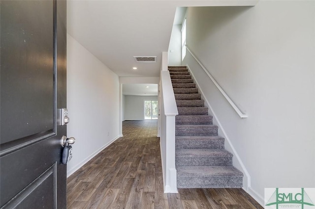 entrance foyer with dark hardwood / wood-style flooring