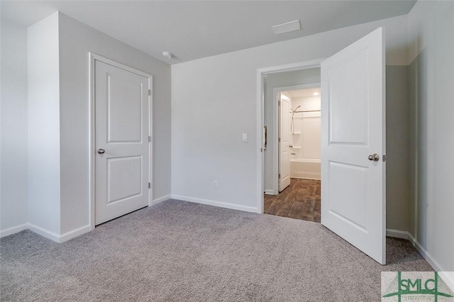 unfurnished bedroom featuring carpet flooring