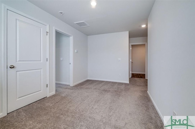 view of carpeted spare room