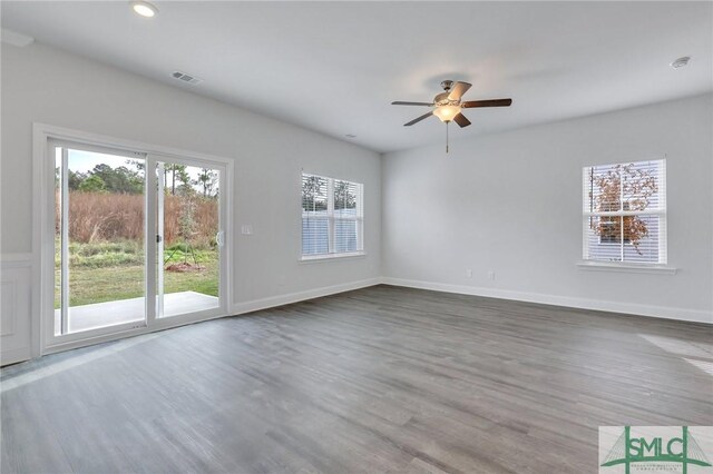 spare room featuring ceiling fan and wood-type flooring