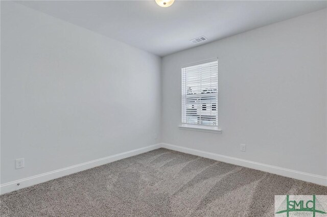 unfurnished room featuring carpet flooring