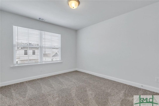 view of carpeted spare room