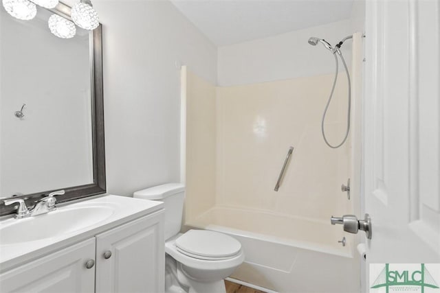 full bathroom with vanity, tub / shower combination, and toilet