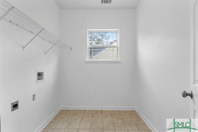 laundry room with hookup for an electric dryer and hookup for a washing machine