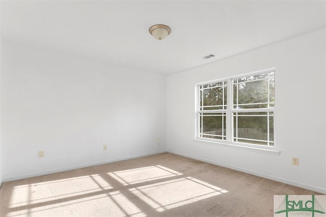 view of carpeted spare room