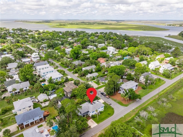 drone / aerial view with a water view